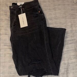 Lucky Brand Women’s washes/faded black High Rise 90s loose straight jean size 12
